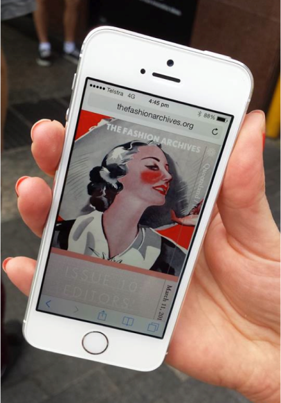 Mobile phone displaying The Fashion Archives mobile website